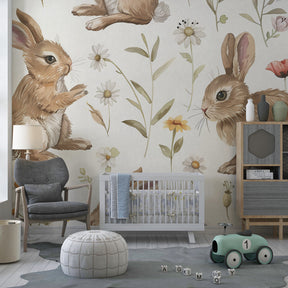 Playful bunny mural wallpaper transforming children's bedroom with soft beige and green floral design
