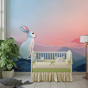 White rabbit sunset wallpaper decorating modern children's bedroom with calming pastel mountain landscape