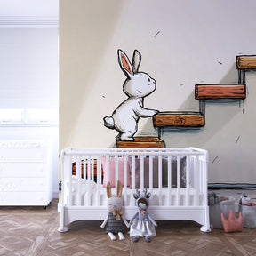 Colorful rabbit stairs wallpaper inspiring adventure in kids playroom by Kids-Mundo