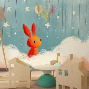 Blue and terracotta rabbit wallpaper transforming modern baby bedroom with starlit sky design