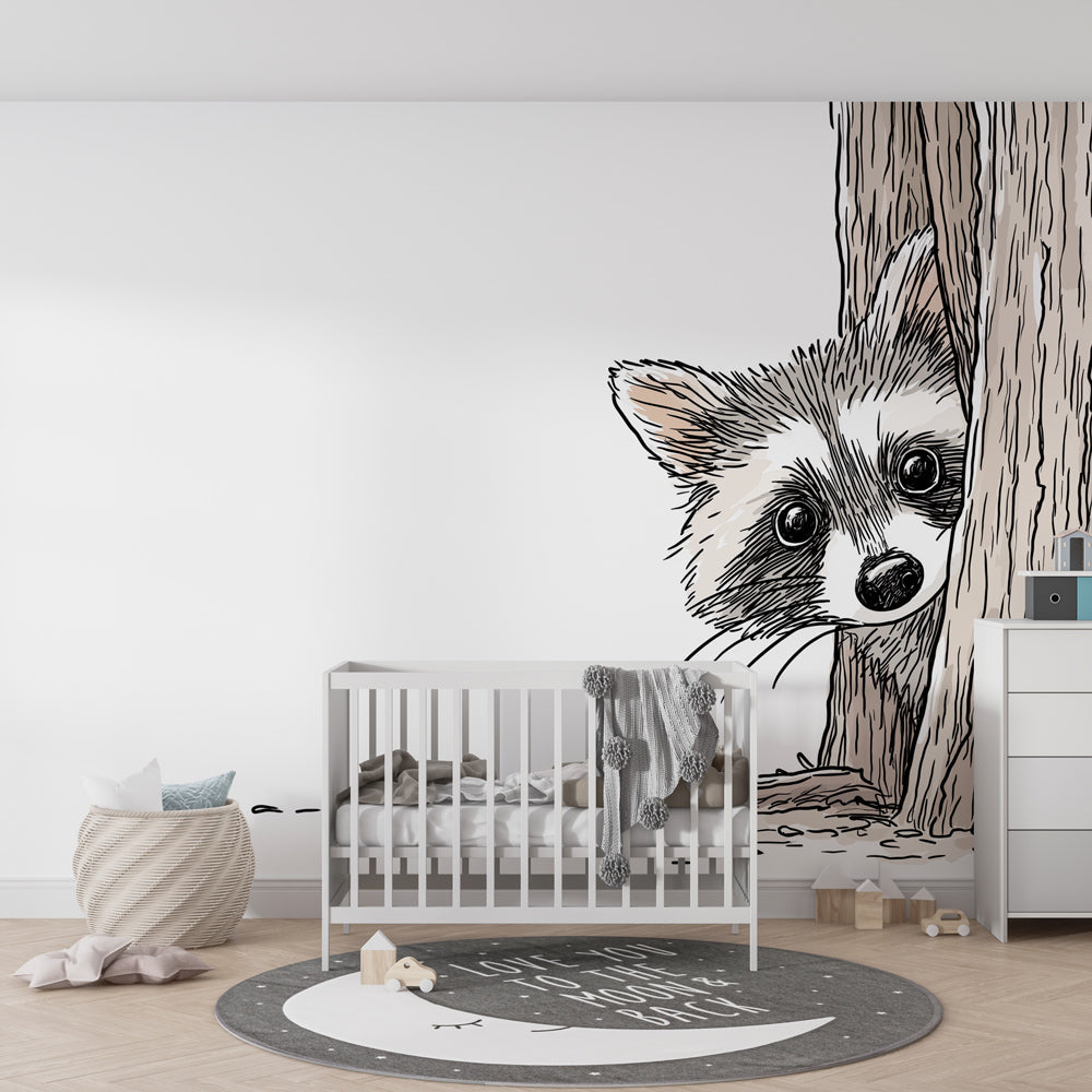 Woodland raccoon wallpaper creating magical forest atmosphere in kids playroom