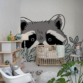 Woodland raccoon mural wallpaper transforming children's playroom into forest sanctuary