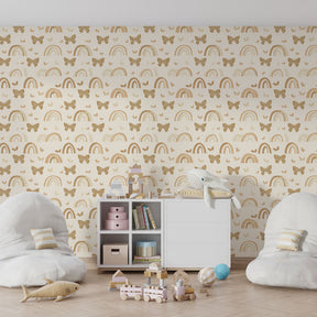 Golden butterfly and rainbow wallpaper creating magical children's bedroom decor with natural wood furniture