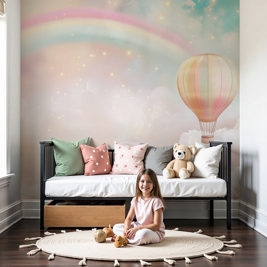 Kids-Mundo pastel rainbow and hot air balloon wall mural in a soft baby nursery