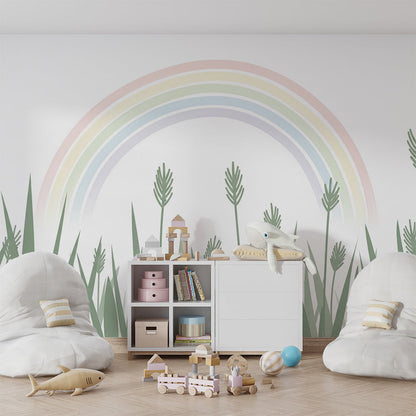 Kids-Mundo rainbow meadow wall mural behind a bed in a soft, modern kids bedroom