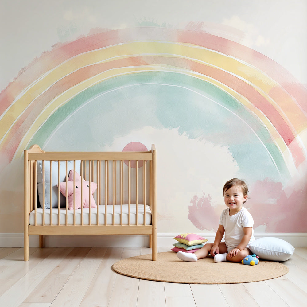 Pastel watercolor rainbow mural wallpaper in modern baby nursery with gentle sun design by Kids-Mundo