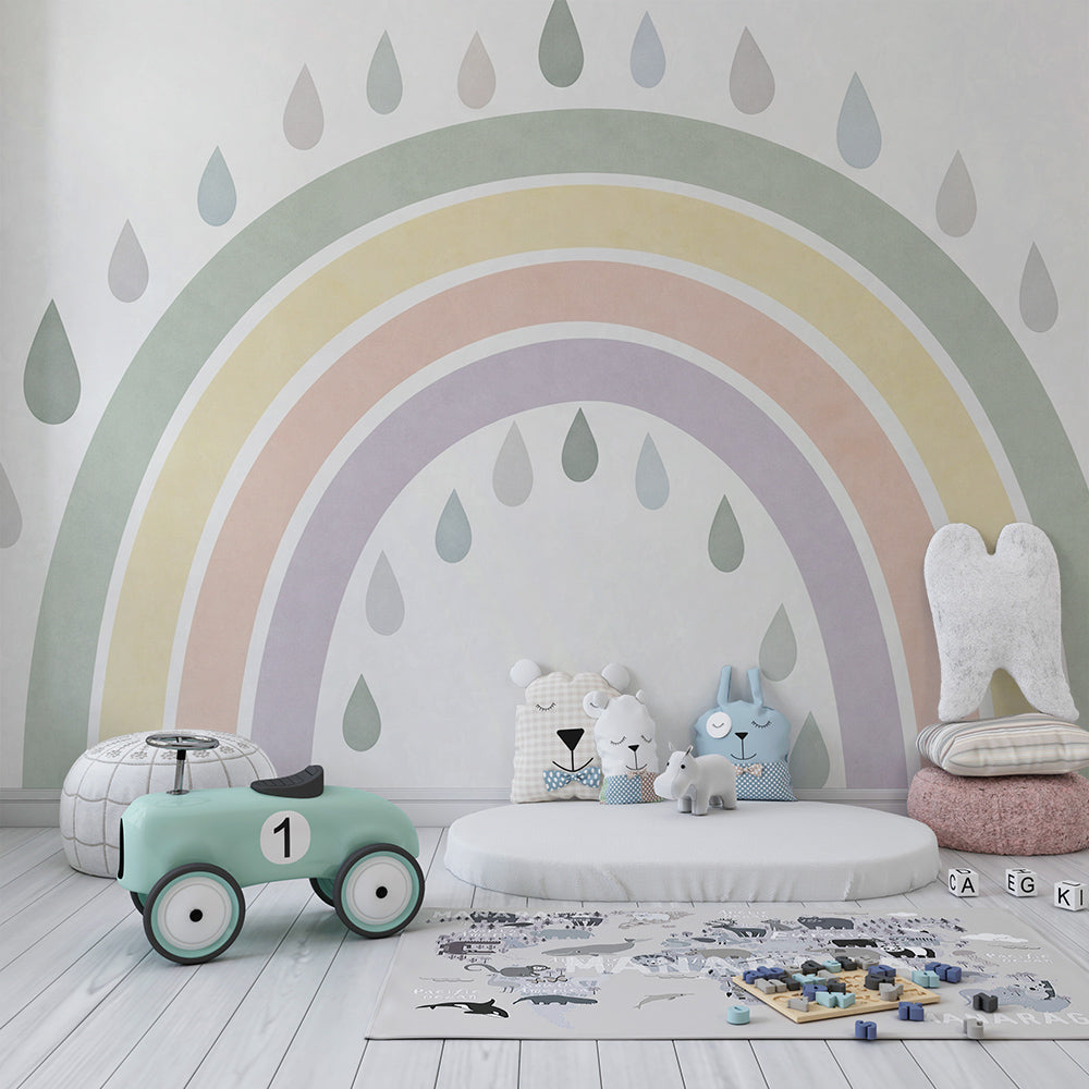 Kids-Mundo rainbow raindrops wall mural covering the back wall of a playroom