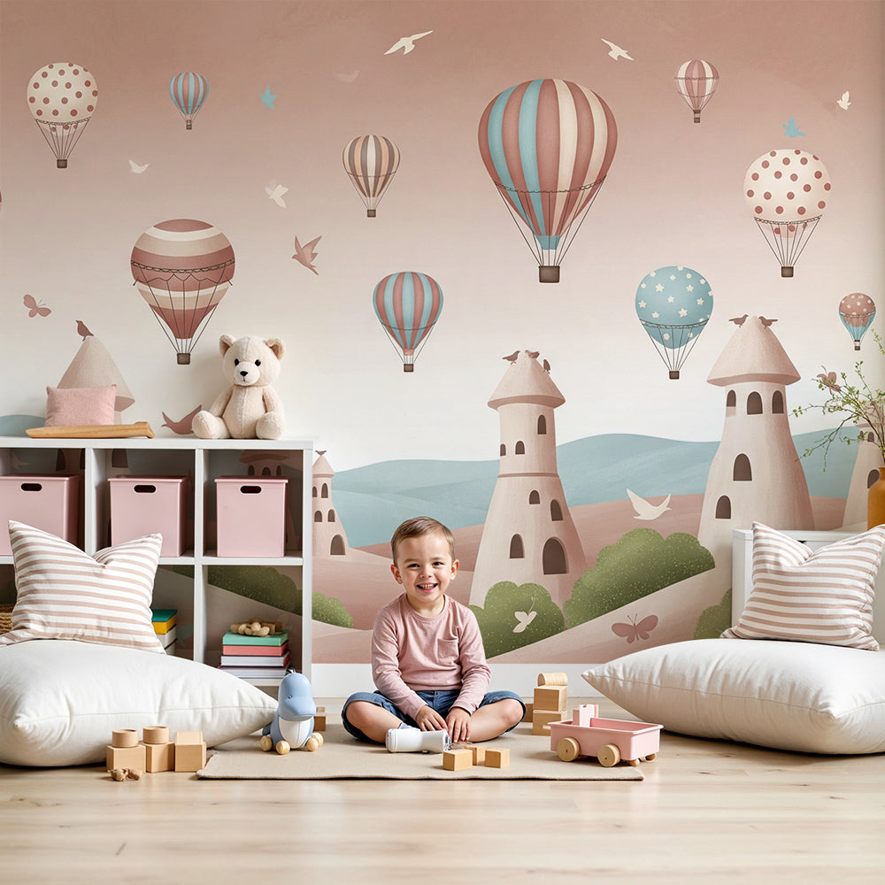 Kids-Mundo rose-pink castle tower wall mural styled in a soft nursery room
