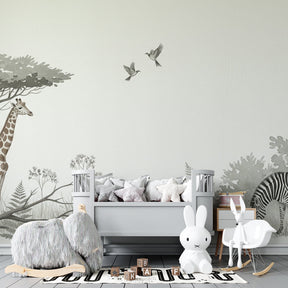Giraffe and zebra wallpaper creating peaceful safari atmosphere in kids bedroom