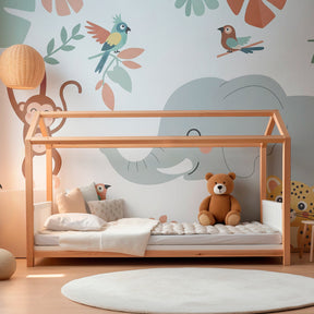 Playful jungle animals wallpaper creating adventurous kids bedroom atmosphere