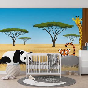 Animal themed mural wallpaper featuring savanna scene in bright children's playroom setting
