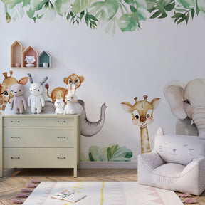 Green safari themed mural wallpaper transforming kids playroom into tropical adventure space