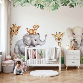 Safari animals mural wallpaper creating tropical nursery decor with green jungle theme by Kids-Mundo