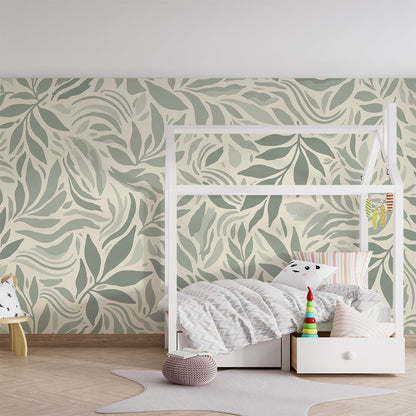 Kids-Mundo sage green leaf wall mural covering a wall in a calm children's playroom corner