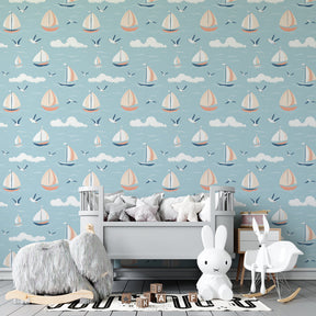Maritime sailboat mural wallpaper for modern children's playroom with sky blue background