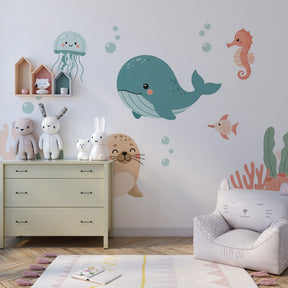 Ocean animals wallpaper featuring seahorses and seal in colorful children's playroom setting