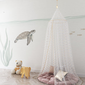 Ocean themed nursery with sea turtle wallpaper and soft marine colors by Kids-Mundo