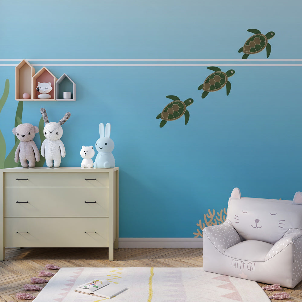 Ocean themed mural wallpaper featuring sea turtles creating calming children's bedroom atmosphere