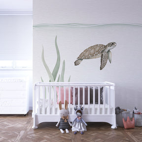 Gentle sea turtle mural wallpaper with seaweed and fish for kids room by Kids-Mundo