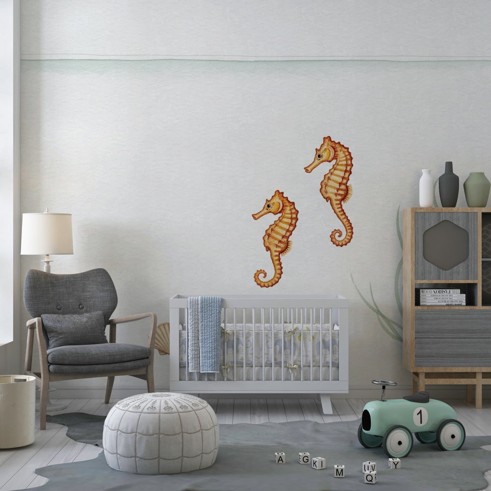 Soft golden seahorse mural wallpaper for calming baby nursery environment