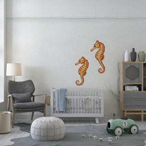 Soft golden seahorse mural wallpaper for calming baby nursery environment