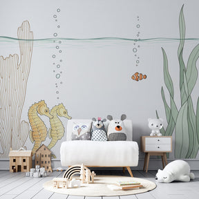 Ocean themed seahorse wallpaper creating peaceful underwater atmosphere in baby room