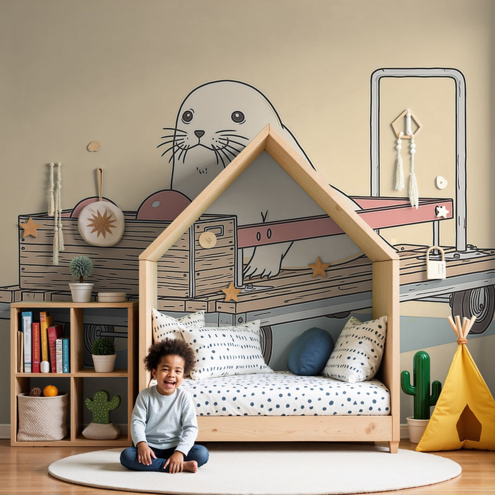 Playful seal mural wallpaper with cart design in modern nursery room by Kids-Mundo