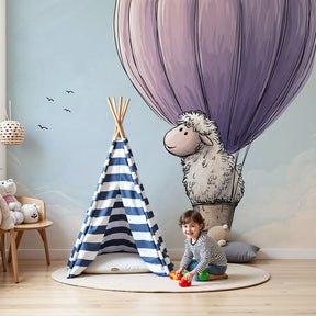 Sheep hot air balloon mural wallpaper creating dreamy atmosphere in modern nursery by Kids-Mundo