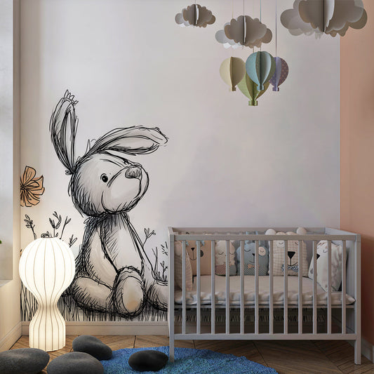 Kids-Mundo bunny wall mural behind a bed in a gentle, storybook-style kids bedroom