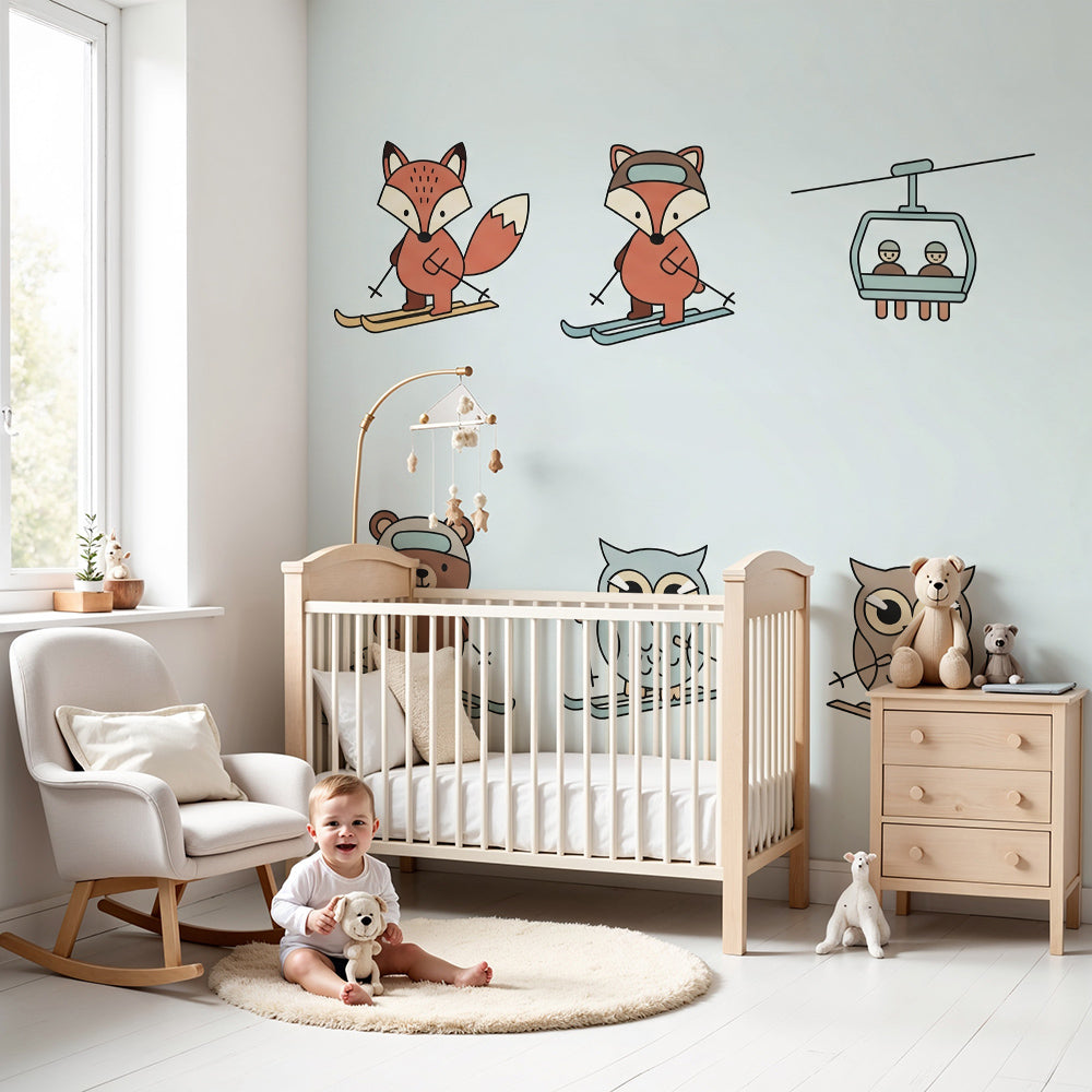 Kids-Mundo skiing woodland animals wall mural styled in a bright kids nursery room