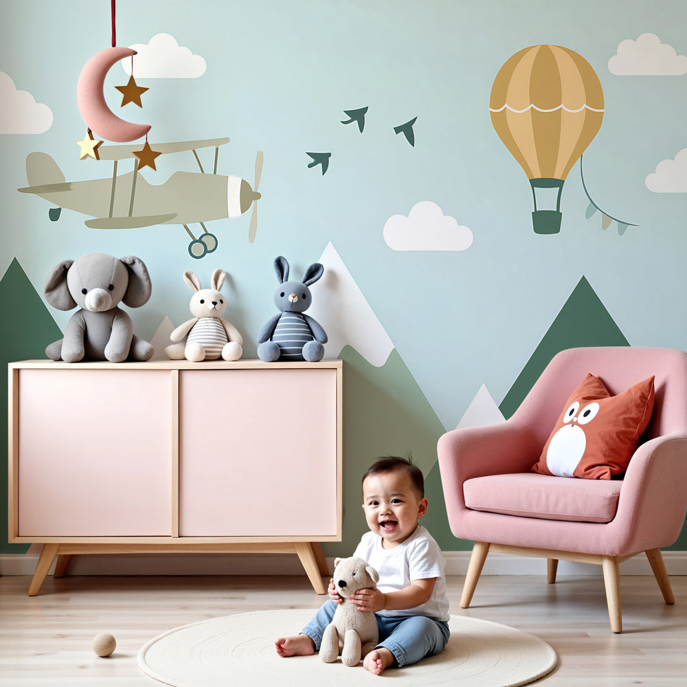 Sky adventure mural wallpaper with airplane and hot air balloon in bright nursery by Kids-Mundo
