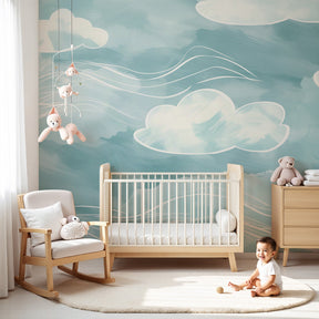 Soft blue watercolor sky clouds mural wallpaper in peaceful baby nursery by Kids-Mundo