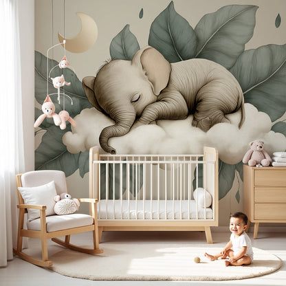 Kids-Mundo sleeping elephant wall mural with sage leaves styled in a soft baby nursery