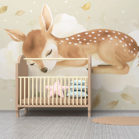 Dreamy fawn mural wallpaper with floating leaves in cozy kids room by Kids-Mundo