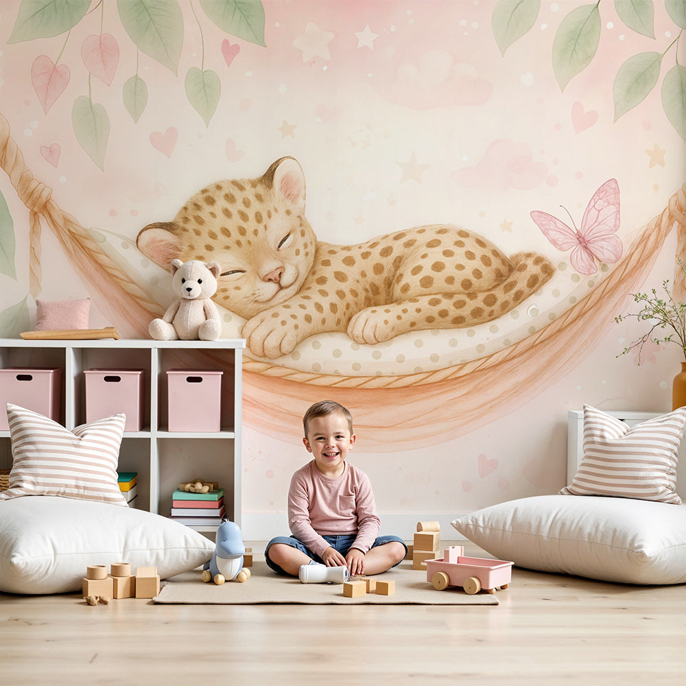 Kids-Mundo sleeping leopard cub wall mural styled in a soft, dreamy pink nursery.