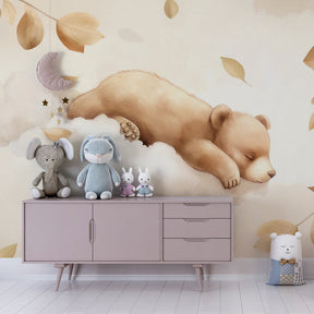 Dreamy bear cloud wallpaper transforming cozy nursery space with golden leaf accents