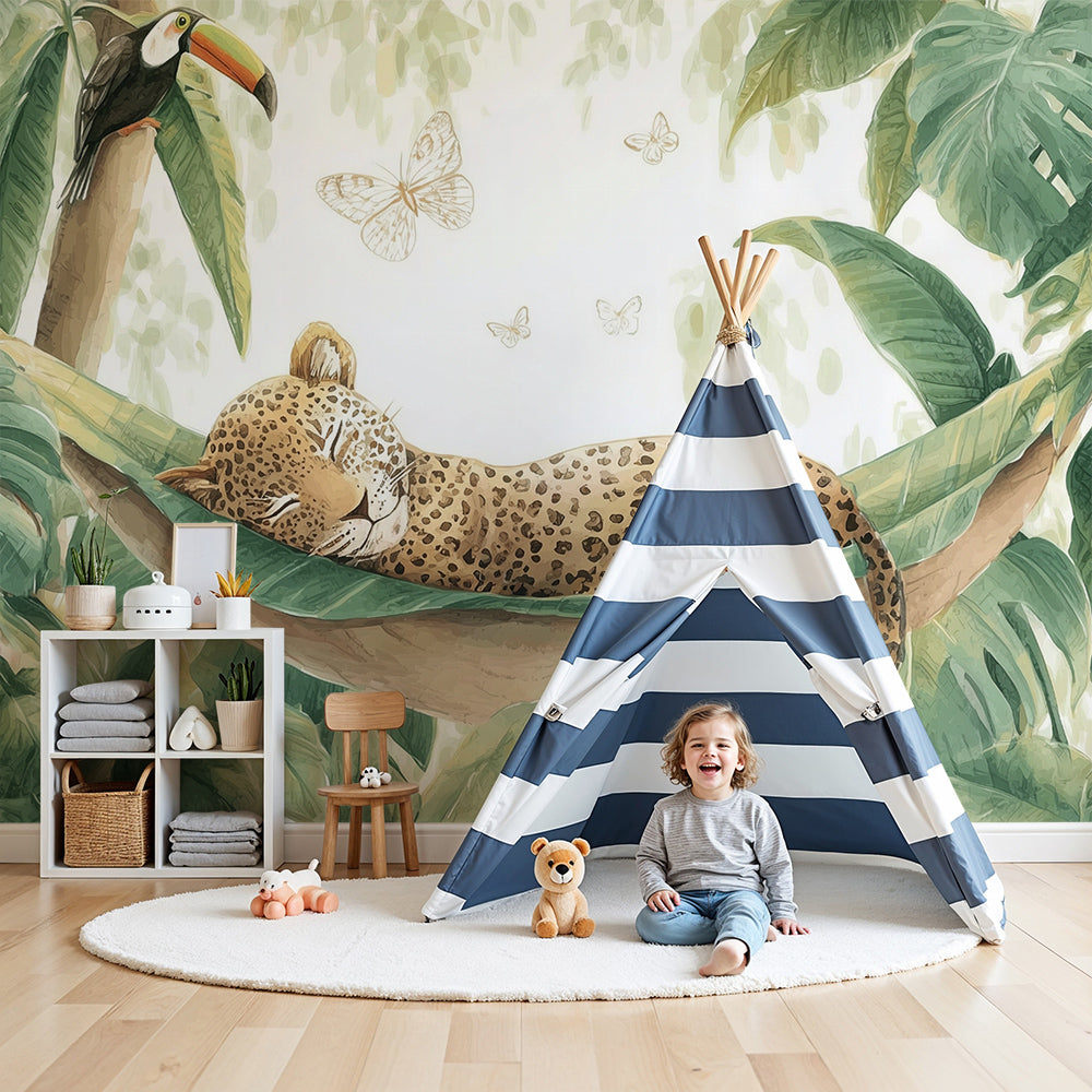 Kids-Mundo sleepy leopard jungle wall mural in a calm nursery with a wooden cot and rug.