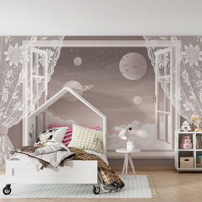 Kids-Mundo lace-curtained Saturn mural above a bed in a child's bedroom.