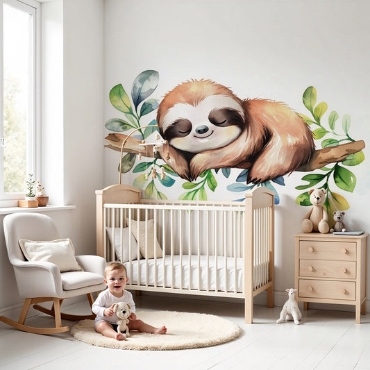 Kids-Mundo sleepy sloth wall mural styled in a soft green and blue nursery with watercolour leaf accents.