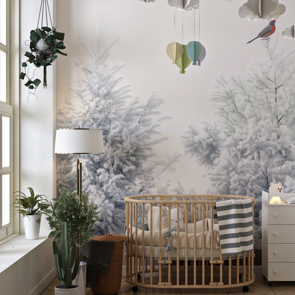 Enchanting snowy forest mural wallpaper transforming children's playroom into winter wonderland