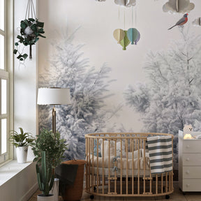 Enchanting snowy forest mural wallpaper transforming children's playroom into winter wonderland