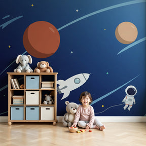 Space adventure mural wallpaper with astronaut and planets in modern kids bedroom by Kids-Mundo