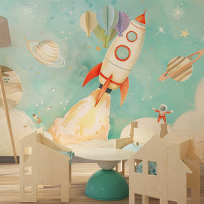 Pastel space themed wallpaper creating dreamy children's bedroom decor with blue background