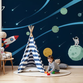 Space adventure mural wallpaper with astronaut and rocket in modern nursery by Kids-Mundo