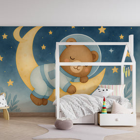 Bear on moon wallpaper creating dreamy atmosphere in children's bedroom decor