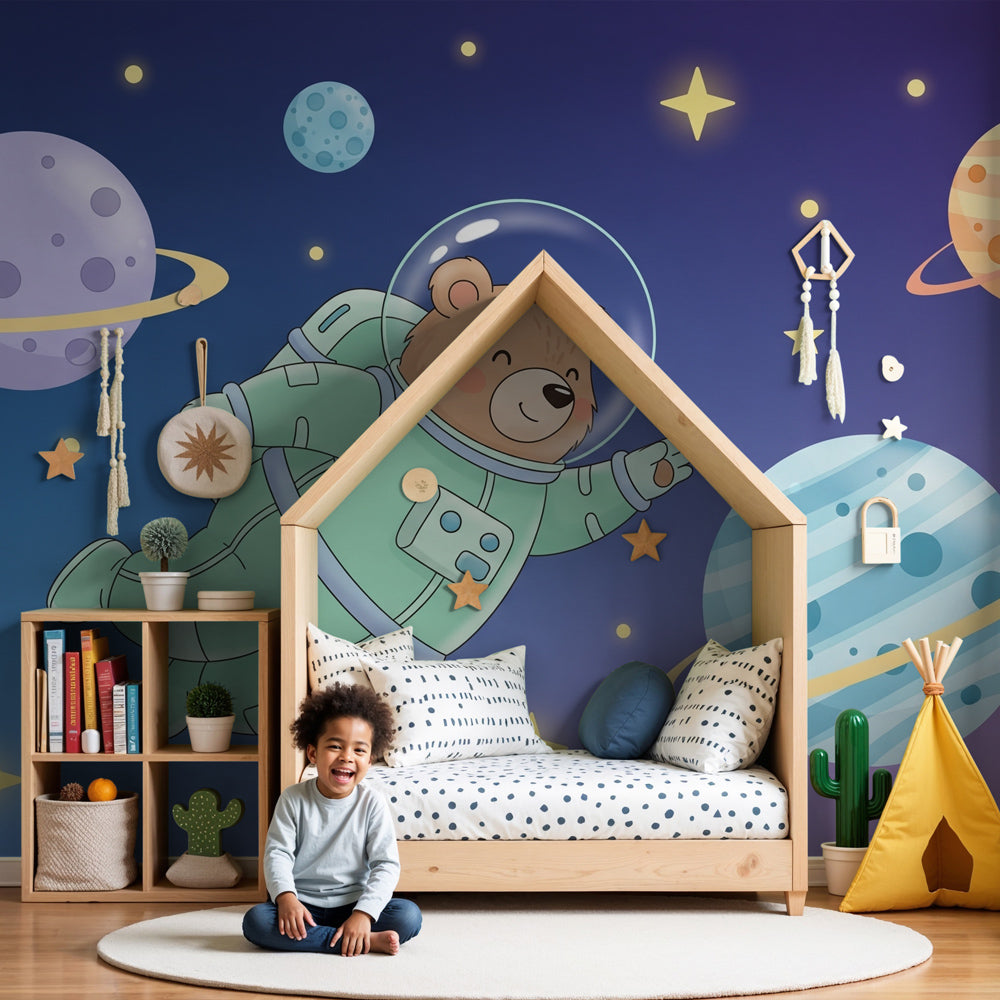 Space bear astronaut mural wallpaper in modern nursery with cosmic planets and stars by Kids-Mundo