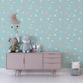 Colorful space adventure wallpaper creating playful atmosphere in kids bedroom with wooden furniture