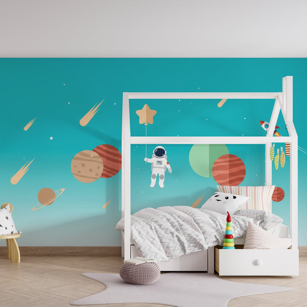 Astronaut and planets mural wallpaper creating cosmic children's bedroom decor
