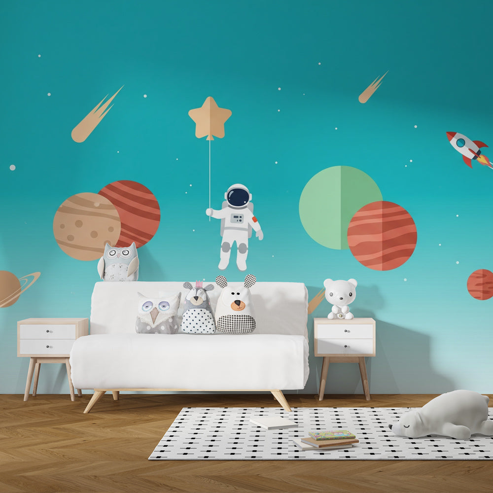 Blue space themed mural wallpaper with astronaut for kids playroom by Kids-Mundo