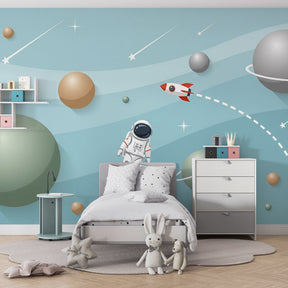 Space-themed mural wallpaper with planets and shooting stars for children's room